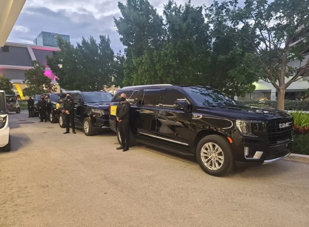 Fleet of black SUVs lined up for event transportation in Miami